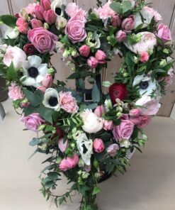 Öppet hjärta med rosa och vita toner